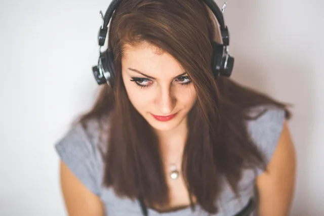 girl, headphones, listen, listening, music, listening to music, brunette, woman, female, lady, dark hair, brown hair, portrait, technology, headphones, headphones, headphones, listen, listen, listening, listening, listening, music, music, music, music, music. Recording coaching feedback beside a support case